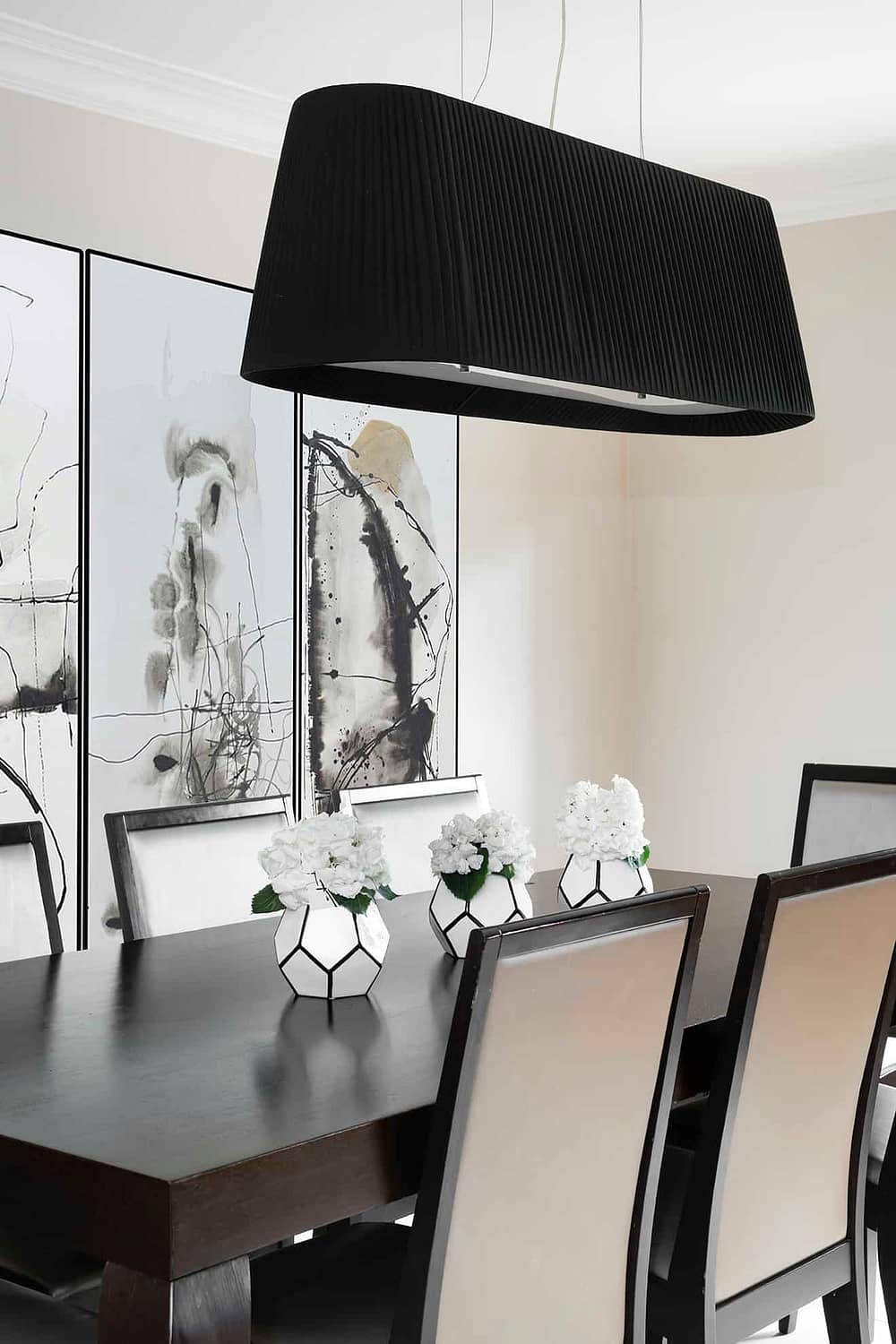 Dining table and artwork by our interior designer in Brentwood