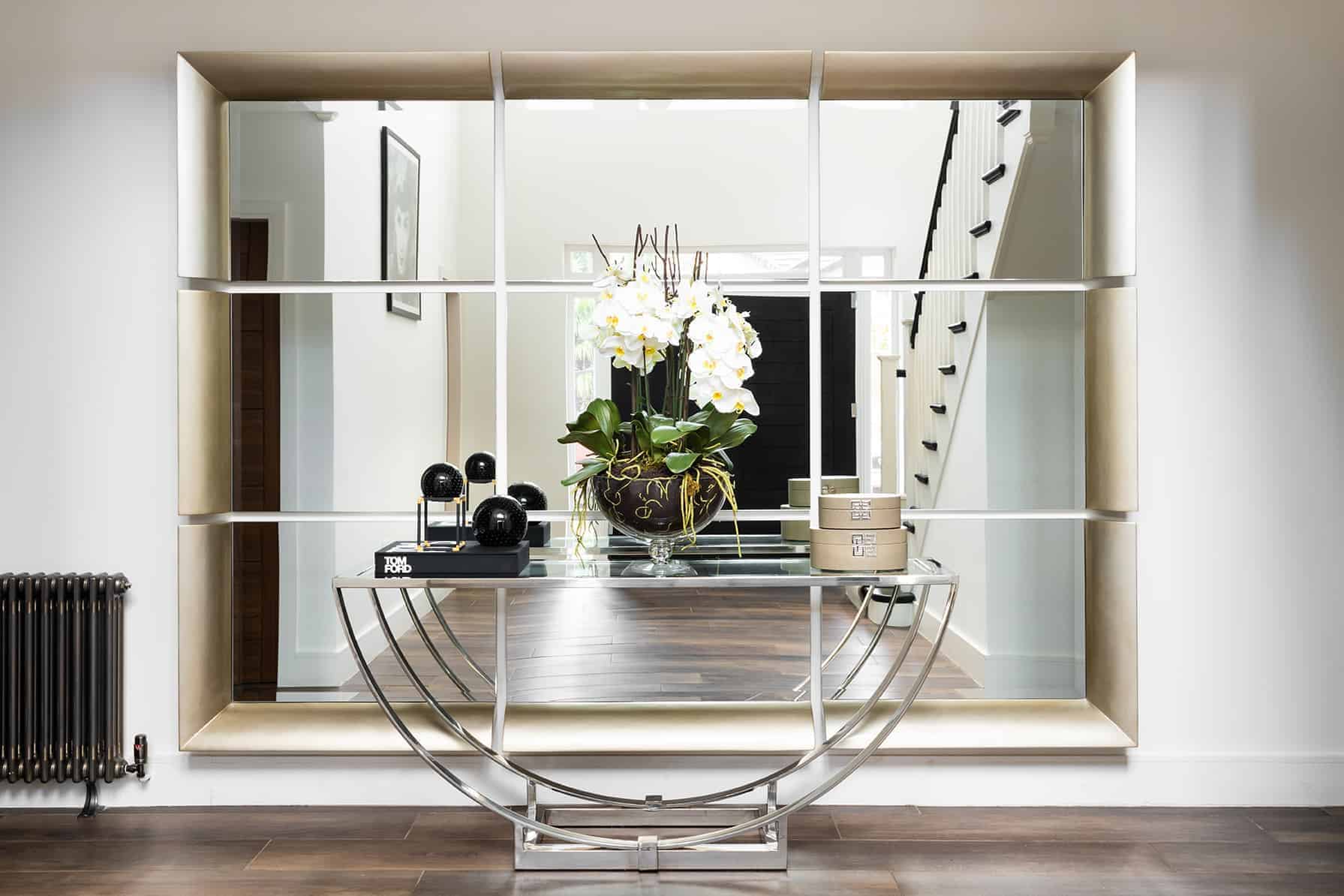 Our Interior Designers in Loughton use this mirror for the grand entrance