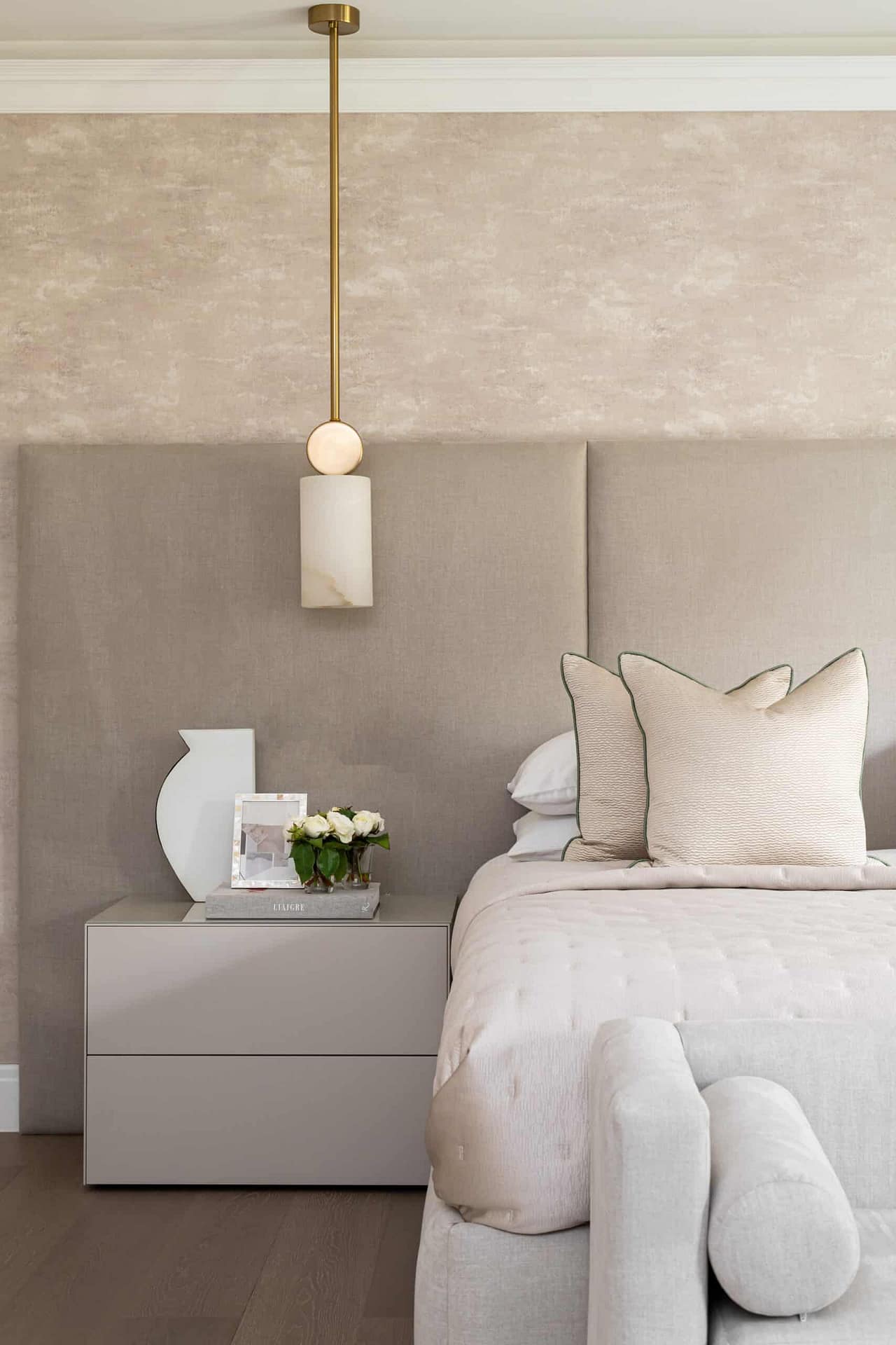 Interior Designers in Wimbledon designed this bedroom with exceptional bedside pendants.